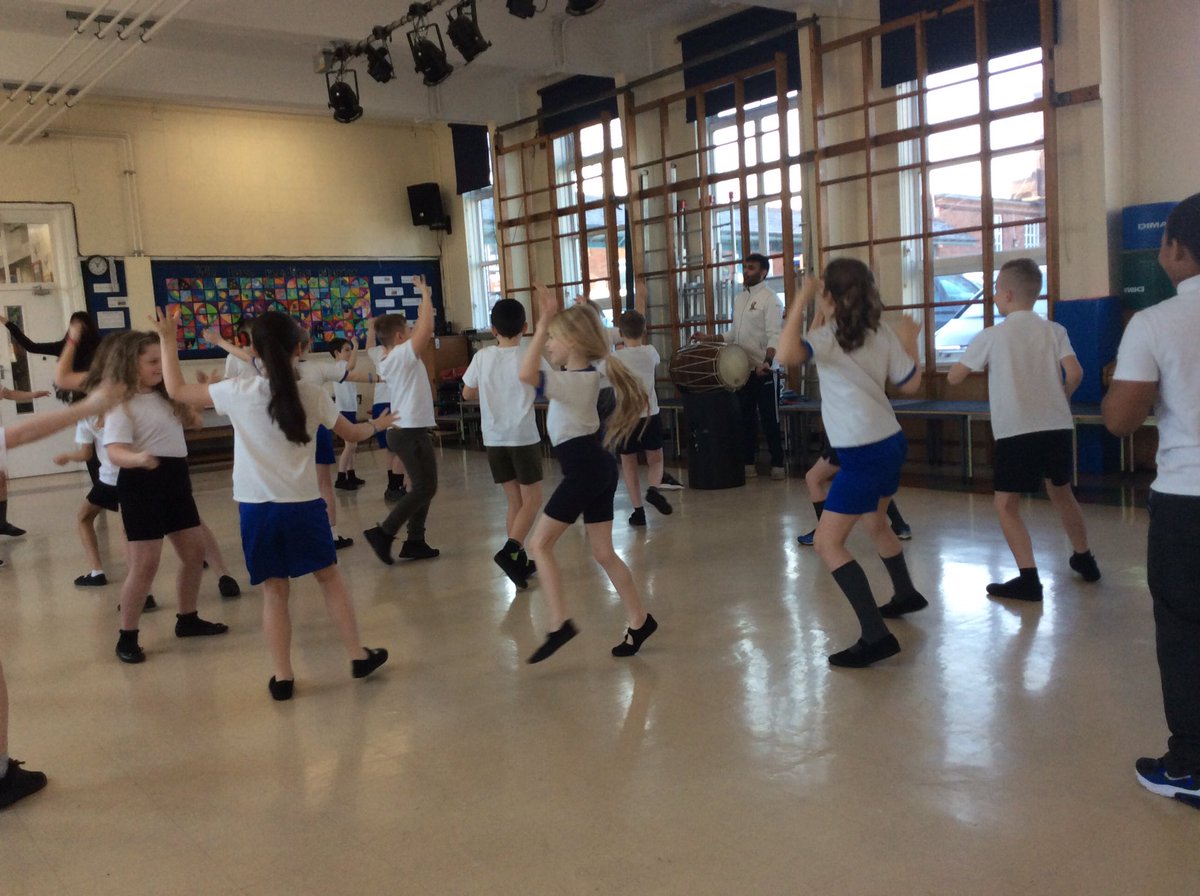 HollyfieldPri's tweet photo. Wow! What a treat Year 4 have had this morning! #lovingthedrums #danceisfun #checkoutourmoves @NachdaSansaar https://t.co/1TcQtc59Hn
