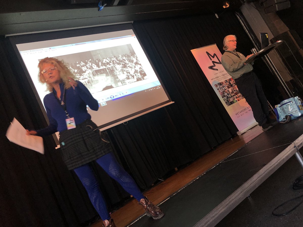 DeDomenici's tweet photo. Jasmine Tesanovic is giving a keynote at the #DigitalWild conference in Trondheim, ably assisted by the glamorous @bruces. #metamorf #teks #jasminetesanovic #brucesterling https://t.co/d3Mdrb1vl7