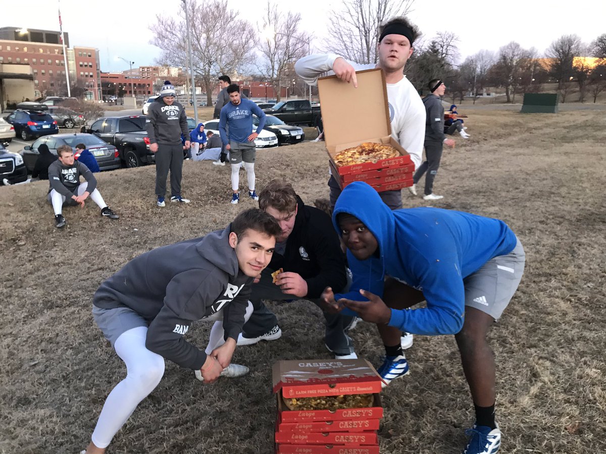 tstepsis's tweet photo. Does it get any more #DSMUSA Iowa than this?!?!  #DSMHometownTeam @DrakeBulldogsFB working hard, Iowa State Capital building in the background, and enjoying some post workout breakfast pizza from @caseysgenstore. Maybe @KimReynoldsIA can join us next time? https://t.co/3gsGF2qXPH