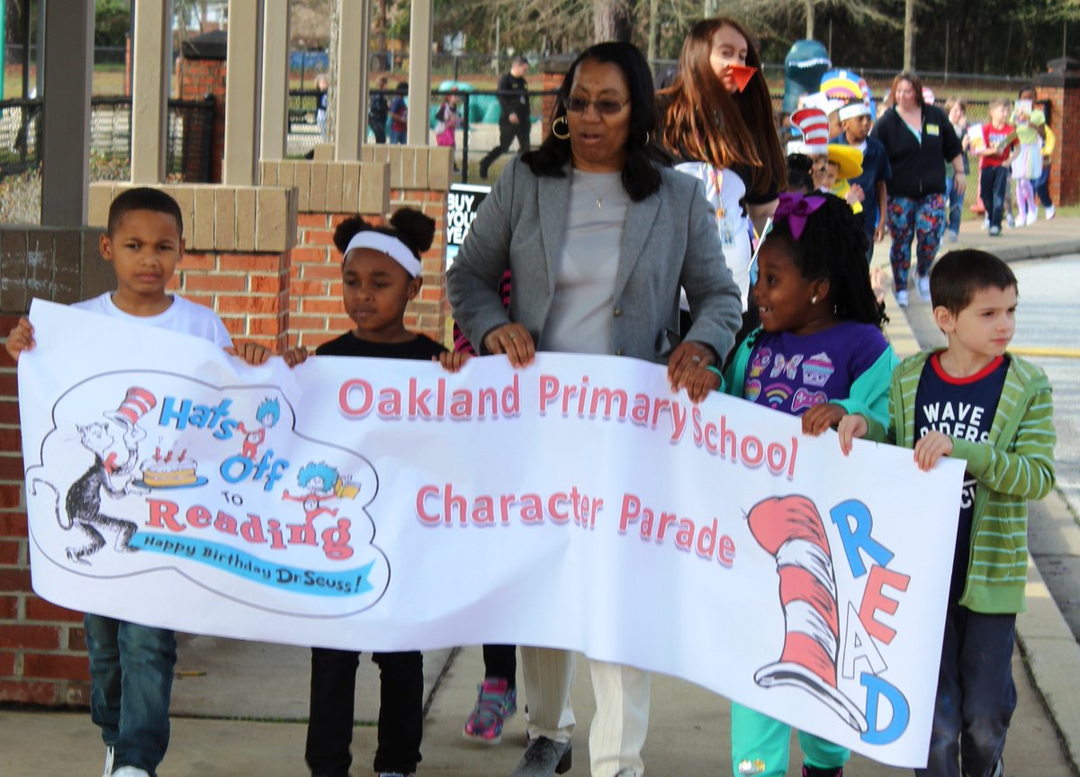 OPS352's tweet photo. Dr. Martin-Knox led the Oakland Primary School Character Parade today and then spent time reading to some classes. Best comment of the day, "Her shoes are pretty Mr. Austin!" #SumterStrong #OakalndStrong @DrPenK @shelly_galloway @SumterSCSchools https://t.co/FMbSXEXNeN