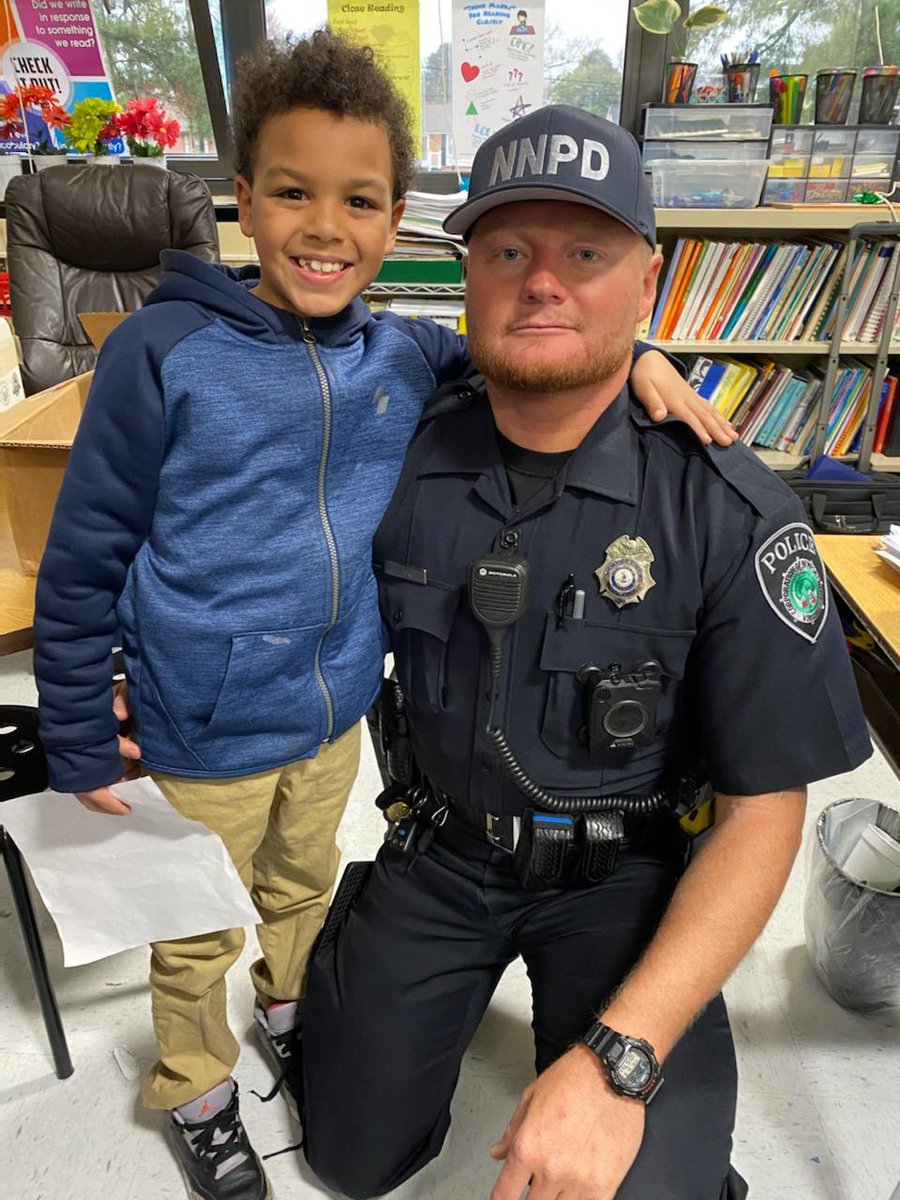 NnpdOutreach's tweet photo. Officers Black and Harris visited R.O. Nelson Elementary School during Carrer Day. https://t.co/SqjErFrhsh