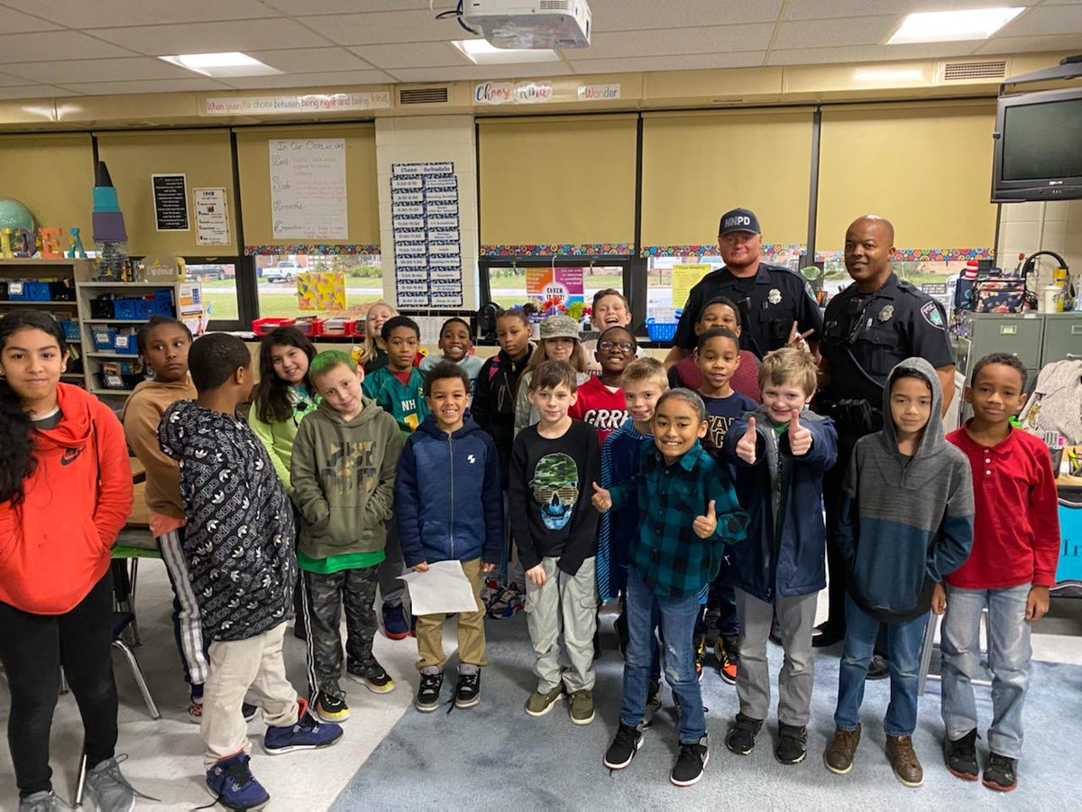 Officers Black and Harris visited R.O. Nelson Elementary School during Carrer Day.