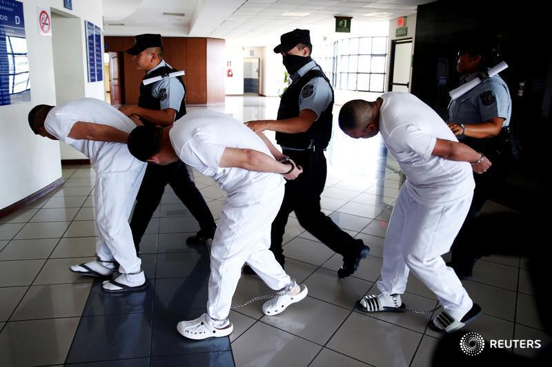 reuterspictures's tweet photo. Former police officers face charges in El Salvador for the aggravated homicide and kidnapping of Camila Diaz Cordova, a transgender woman in their custody who had been deported from the U.S. despite claiming asylum. More photos of the day: https://t.co/gP7IOj9Zx5 📷 Jose Cabezas https://t.co/weECLXRFFG