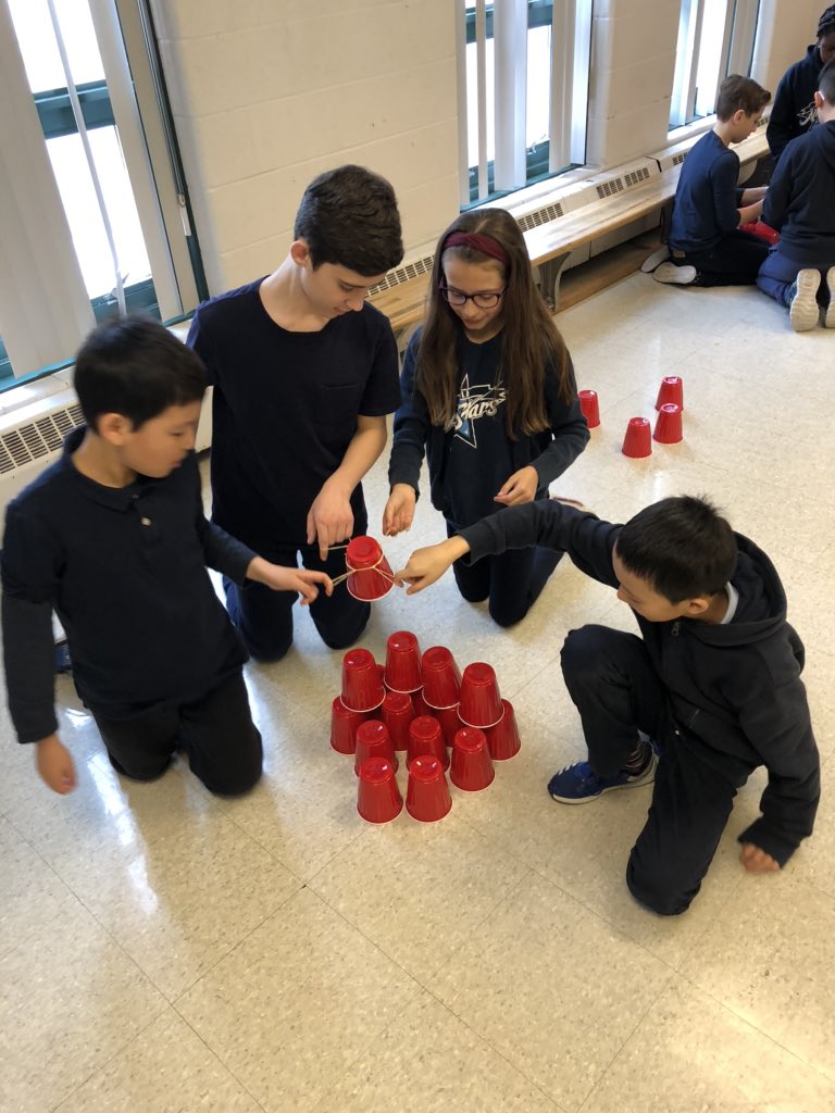 msmartellacci's tweet photo. Hands off! Stacking cups without using any body parts, only elastics. #teambuilding #collaboration #structures @OLAnnunciation @TAcunto @MsKMenna @LdandreaLinda https://t.co/R5nEQtn1jN