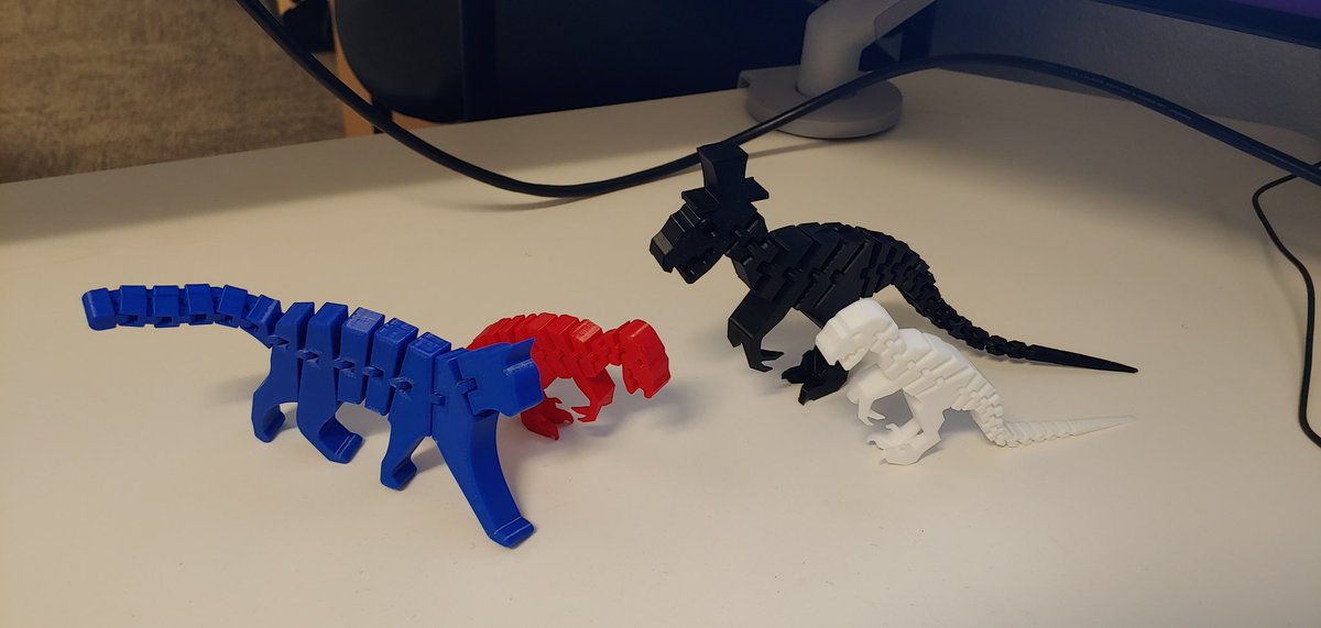 br4nd13's tweet photo. @dhewlett @WJMcCordic My flexi-3D raptors and cat want to fight those unicorns 😂 https://t.co/VeGARP2qsw