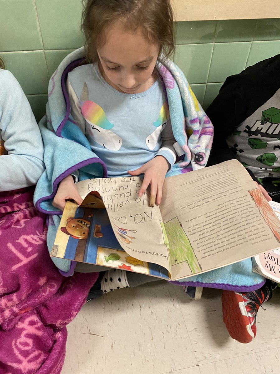 JaniceCirone's tweet photo. Nothing like pajamas and a good book on this rainy Friday! Keep reading Oakview! #ReadAcrossAmerica2020 @OVELEM @wdeptford https://t.co/MmEt5S2rbT