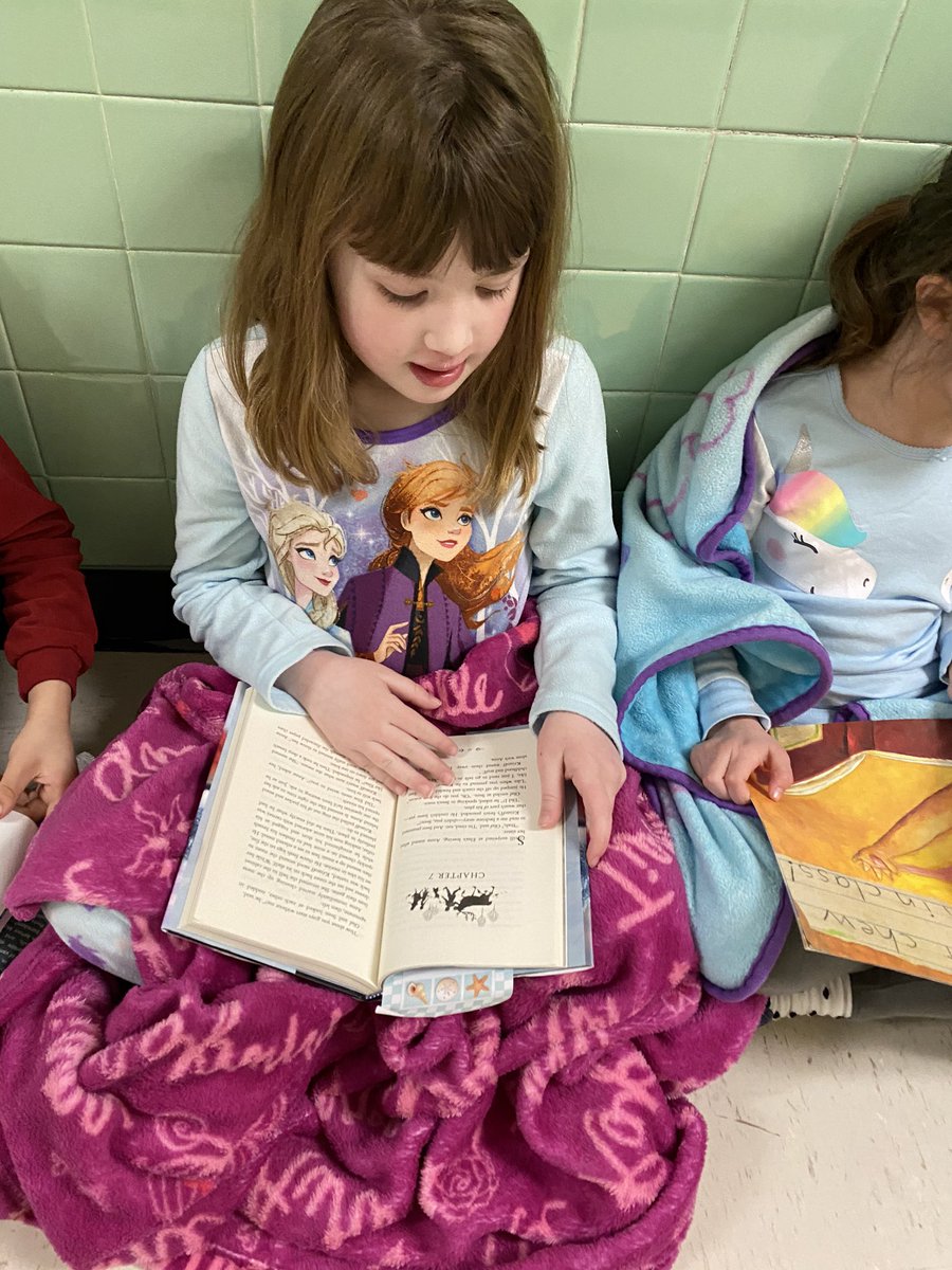 JaniceCirone's tweet photo. Nothing like pajamas and a good book on this rainy Friday! Keep reading Oakview! #ReadAcrossAmerica2020 @OVELEM @wdeptford https://t.co/MmEt5S2rbT