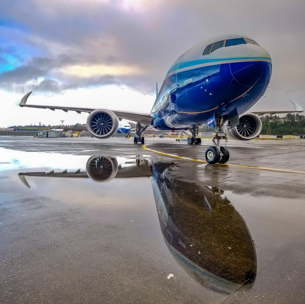 BoeingAirplanes's tweet photo. What a view. #FlashBackFriday to when the #777X flew for the first time. Check out a few never-before-seen photos as our test team continues to work through our rigorous test program. https://t.co/gw0t9wkVru