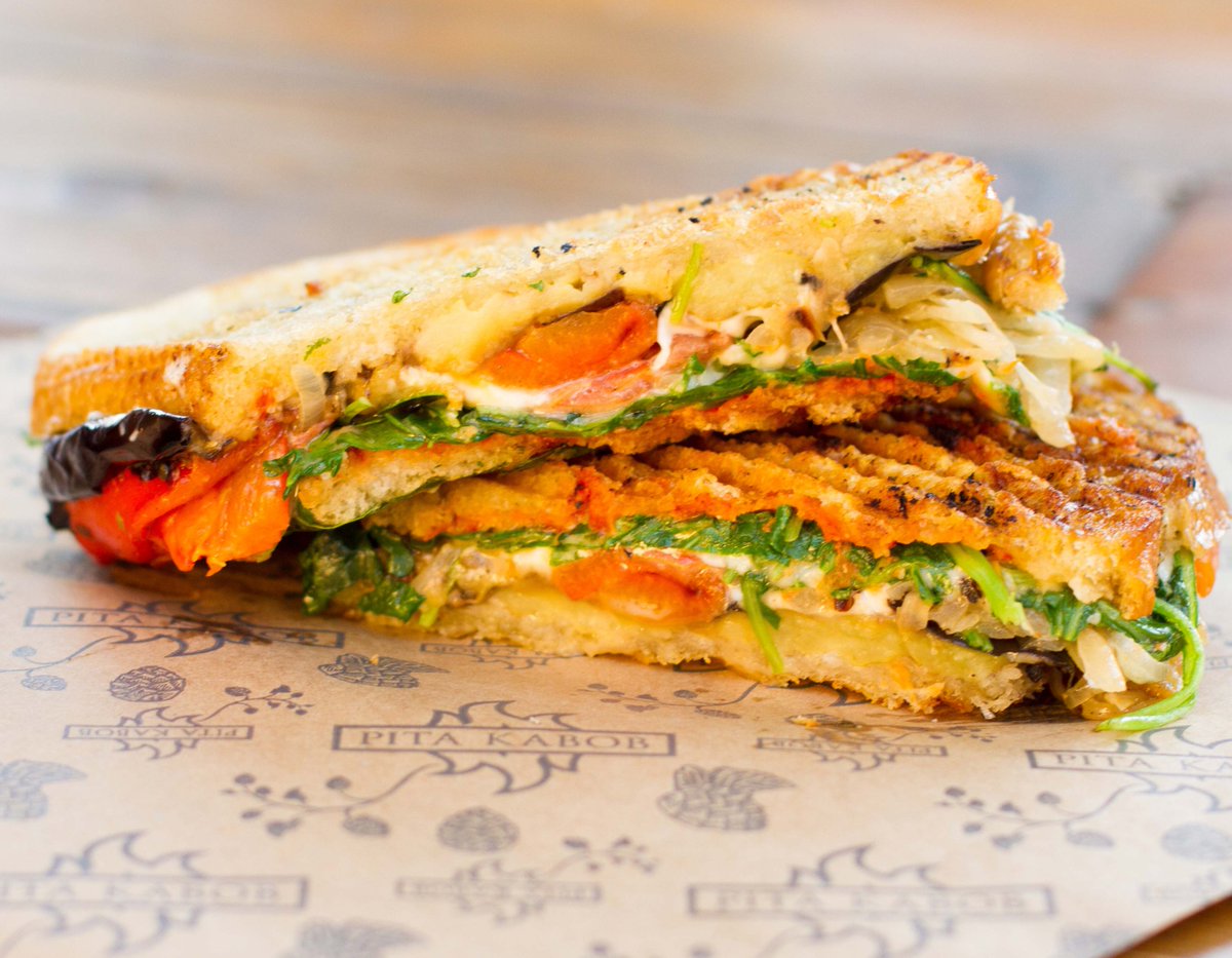 PitaKabob's tweet photo. Happy Friday, everyone! ☺️ Today's #lent special at our #DowntownGastropub is our GRILLED EGGPLANT #PANINI! #Grilled #Eggplant, Grilled Red Bell Pepper, Mozzarella, Red Onions, Mushrooms, Arugula, Garlic Aioli and Tomato Relish pressed in Sourdough. 🤤 https://t.co/HPjNm2lVVu