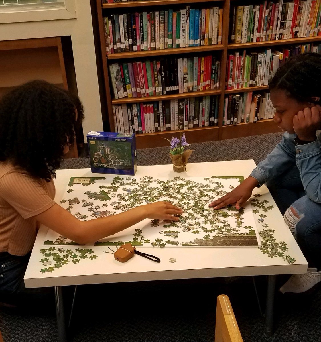 LHS_Library2's tweet photo. Active Friday afternoon in the library... BreakoutEDU, jigsaw puzzle, and math homework! @LCSDLibraries @LiverpoolAnnex1 https://t.co/WPJ23UdZ7q