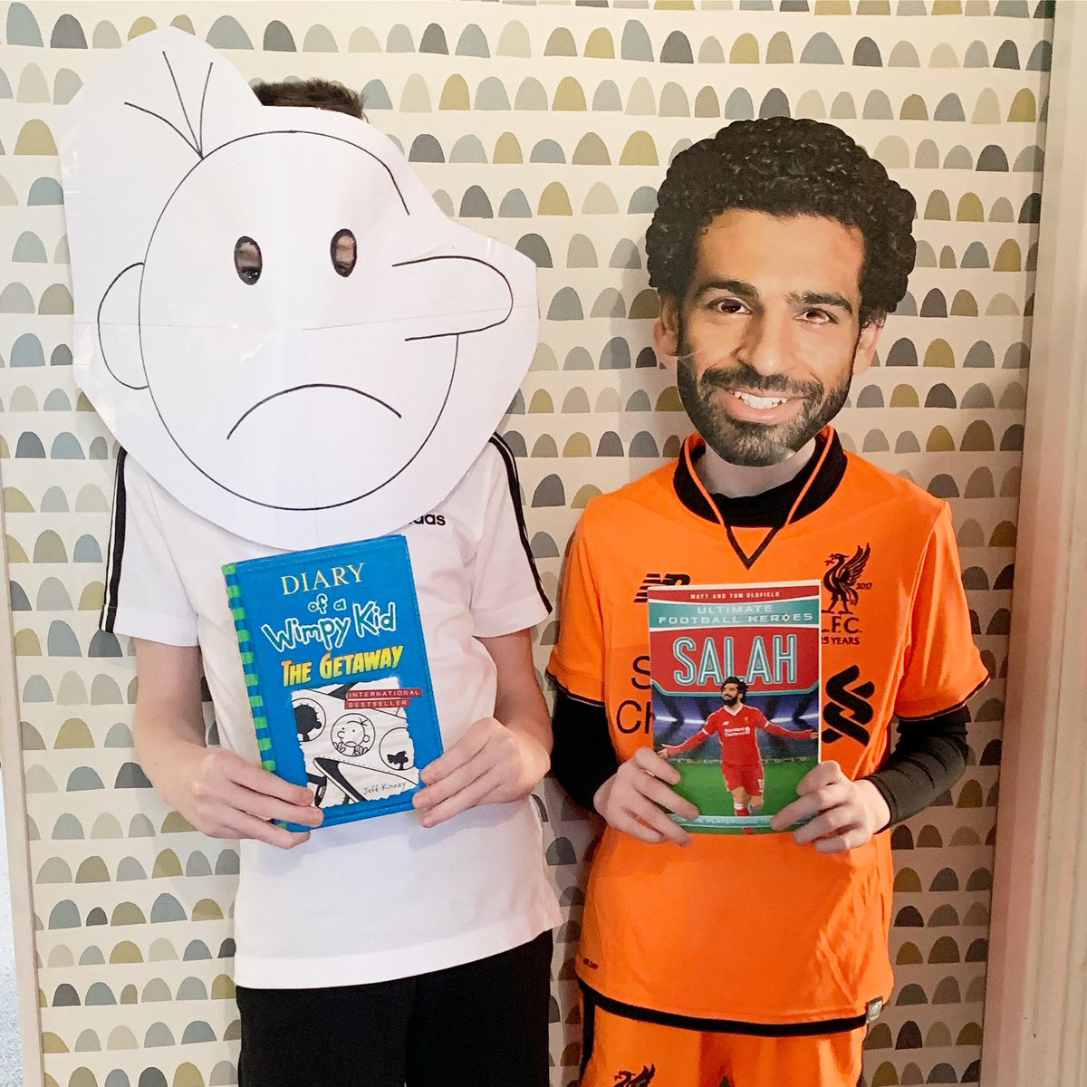 HelpWeeOliver's tweet image. Once upon a time, in a town called Coleraine, Greg Heffley (Oliver) met Mo Salah (Max)
They posed for some pictures &amp;amp; went to school.
The End 😂 
#worldbookday done 🙌🏻
Technically it was yesterday, but the boys school held off until today.
#diaryofawimpykid #MoSalah #liverpoolfc