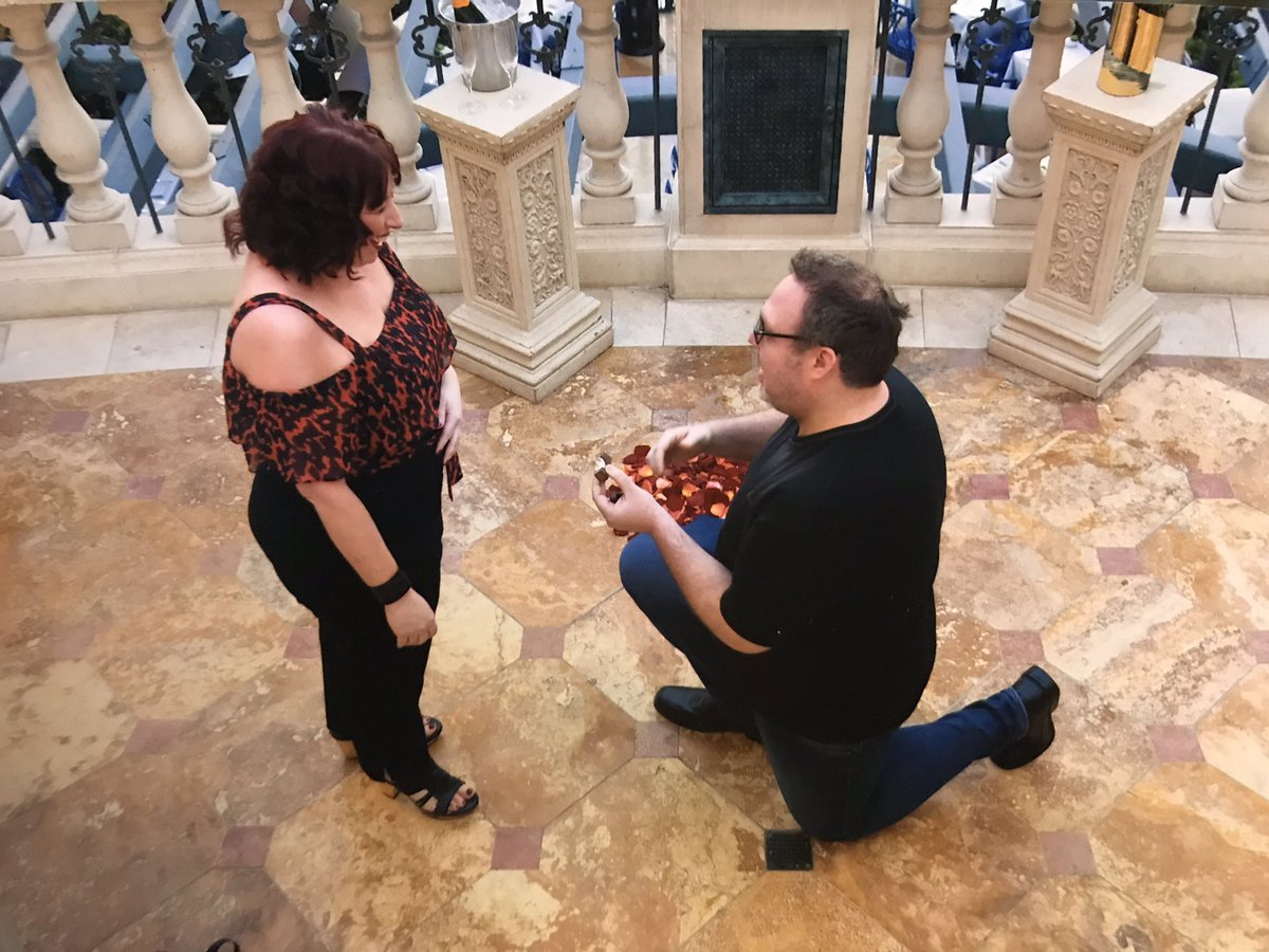 Begas_Vaby's tweet image. So there was a photographer taking pics through the proposal and we’ve just been to pick a small selection of pics. He captured Michael on one knee, YES!! #vegas #vegasproposal