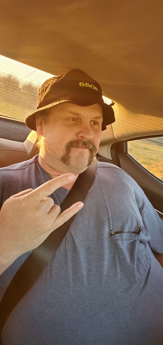 WildflowerRoxie's tweet photo. My dad is living his best life, in the golden hour while wearing my 5sos bucket hat.
I've made him a 5sos stan. You're welcome. https://t.co/pnMnSwiMzl