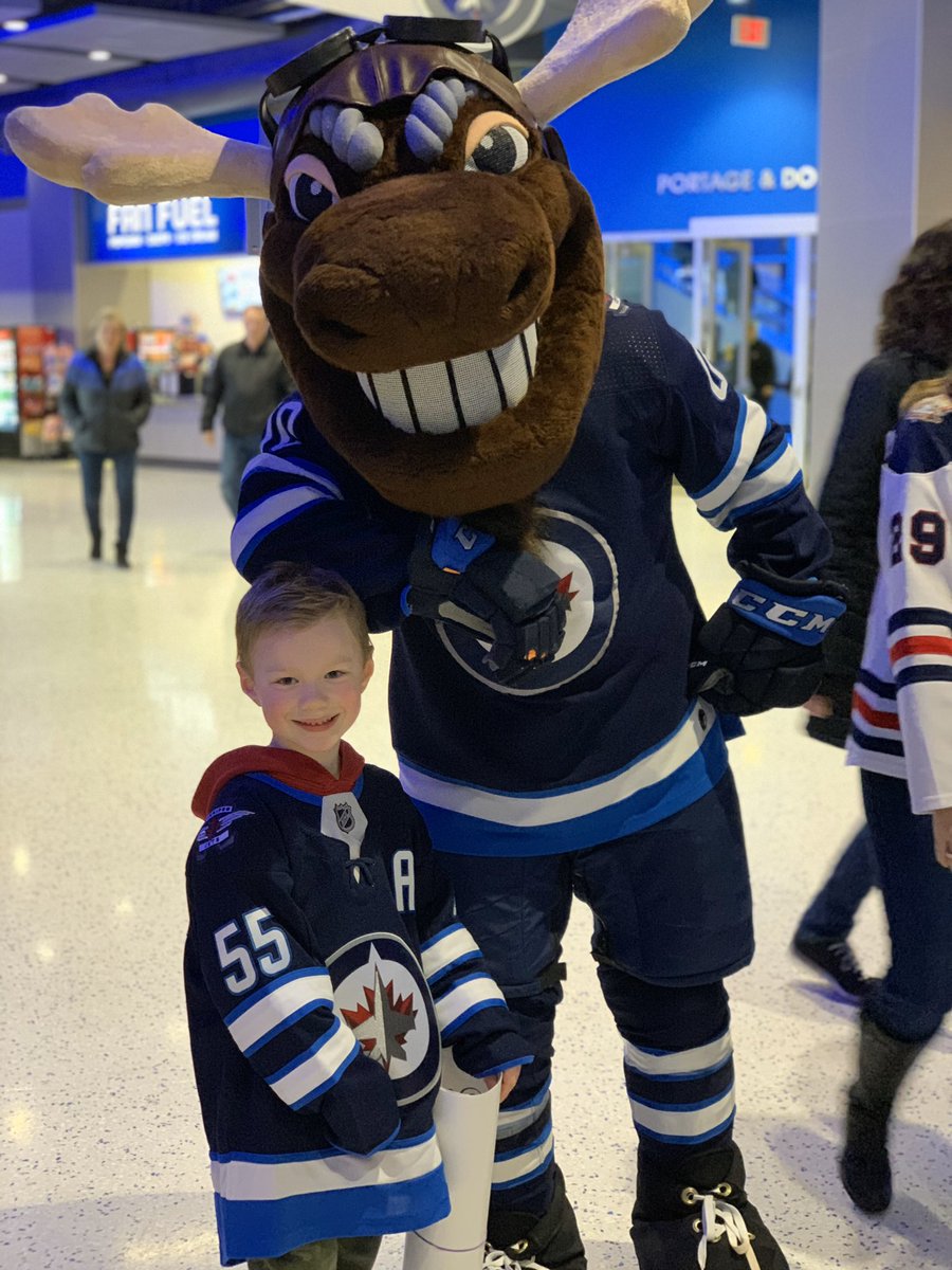chririch's tweet photo. Sawyer’s first NHL game with @NHLJets !!! 
New @markscheifele55 jersey AND practice puck! 
#nhl #GoJetsGo #penseforhockeyville https://t.co/369YbiCEWc