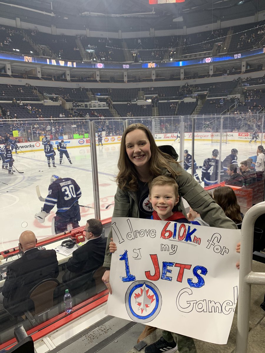 chririch's tweet photo. Sawyer’s first NHL game with @NHLJets !!! 
New @markscheifele55 jersey AND practice puck! 
#nhl #GoJetsGo #penseforhockeyville https://t.co/369YbiCEWc