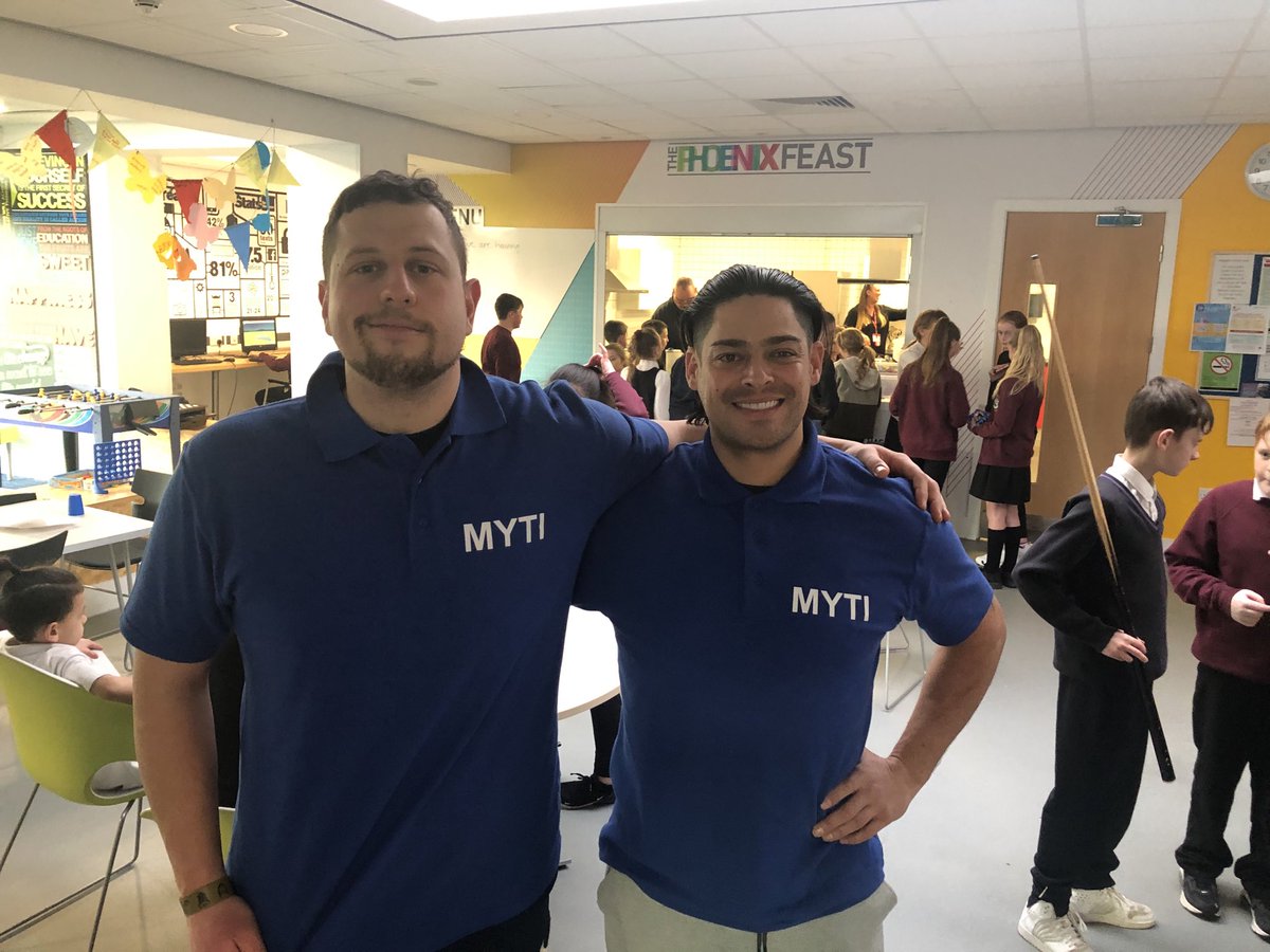 ClubMyti's tweet photo. Great to have Peter at the MYTI Club tonight to help coach football . Peter runs the local initiative Kick It on a Saturday morning at Epsom Downs Primary School playing fields . Here he is meeting Tony one of our directors right the engine room of the club . Over 70 in tonight ! https://t.co/up7zgwdIG4