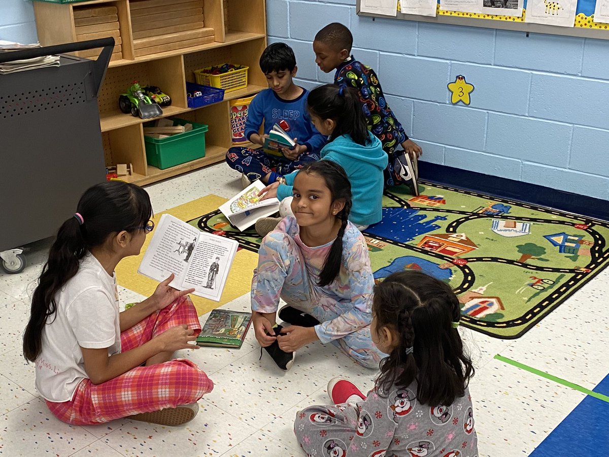 Cozying up with good books and 3rd grade buddies! <a href="/WoodbrookSchool/">Woodbrook School</a>