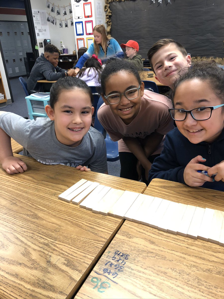 Using fact families to construct rectangles of a given area! #howmanywayscanyoucreate #teamwork #bearshine