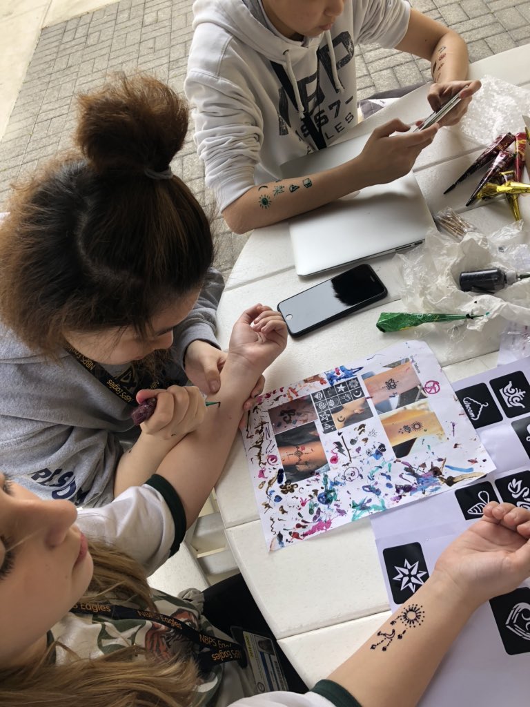 NAHS members helping out at the 6th grade India Festival by drawing henna! <a href="/NBFineArts/">NB Fine Arts</a> <a href="/Weiss14Shelley/">Shelley Weiss</a>