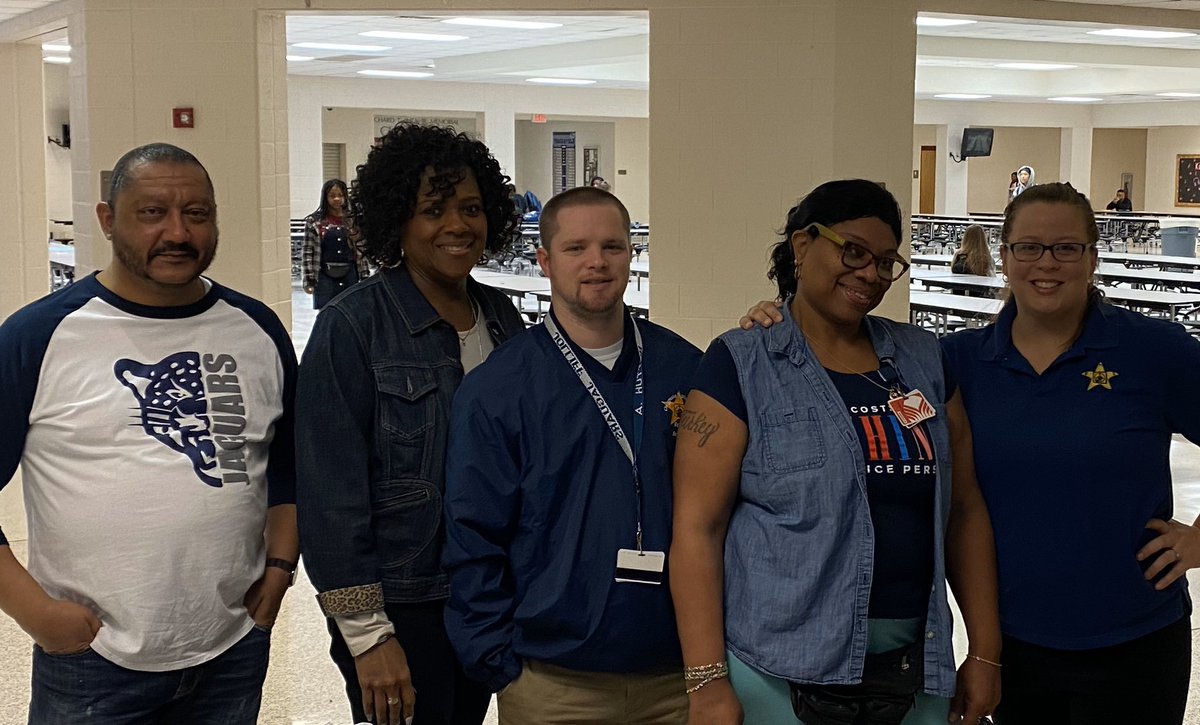 JolliffMiddle's tweet photo. Happy Friday!  This hard-working group of Jag staffers keeps us running smoothly in a variety of ways- securing our building, keeping it shiny, managing silent lunch, and providing instruction...they make Jolliff a great place to be and learn! #jollify https://t.co/WypMOQSBqu