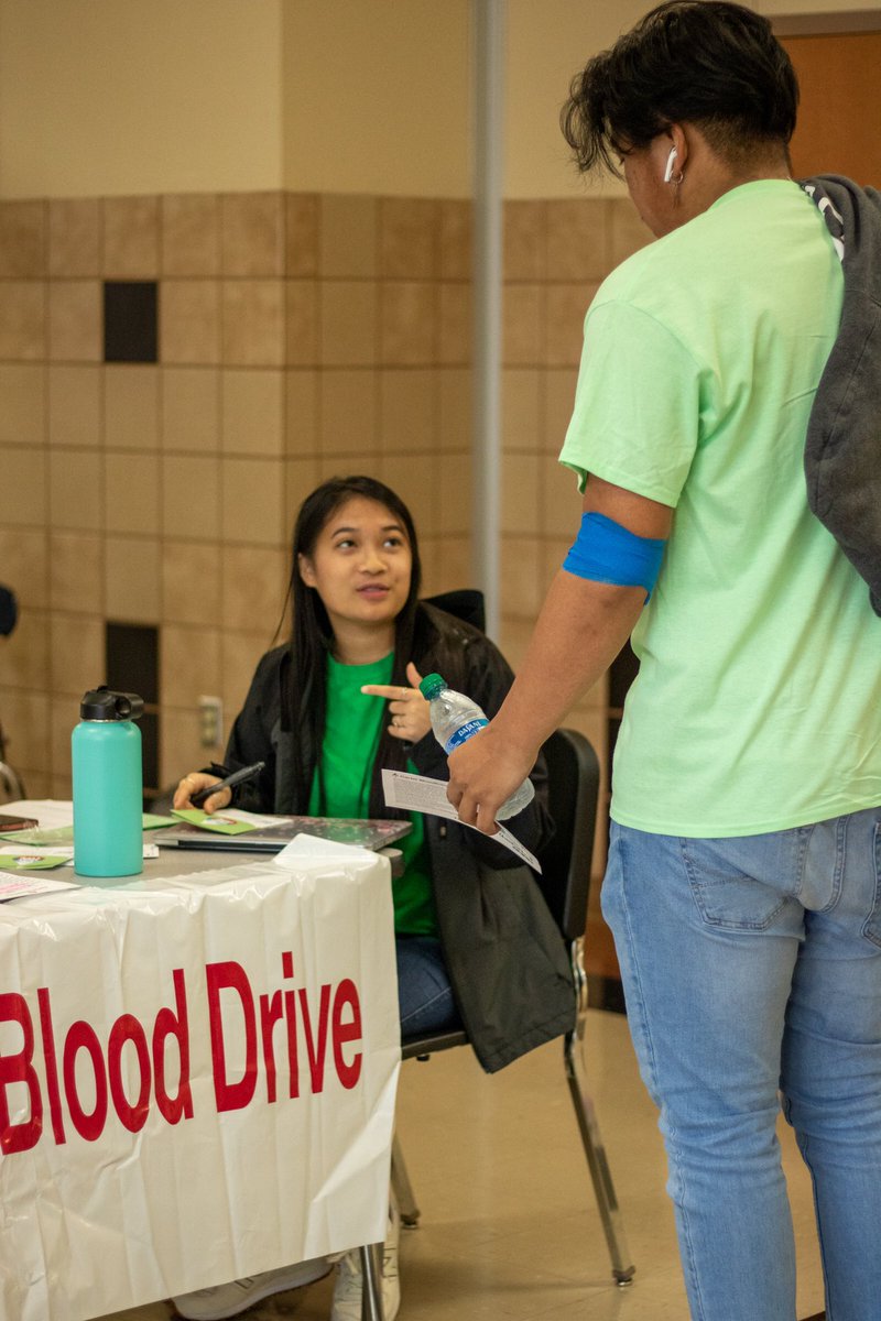 JSHSMedia's tweet image. Hoping to collect blood from her classmates, senior Mary Nguyen helps a student after getting his blood drawn on March 3. HOSA had 56 students donate blood during the charity event
