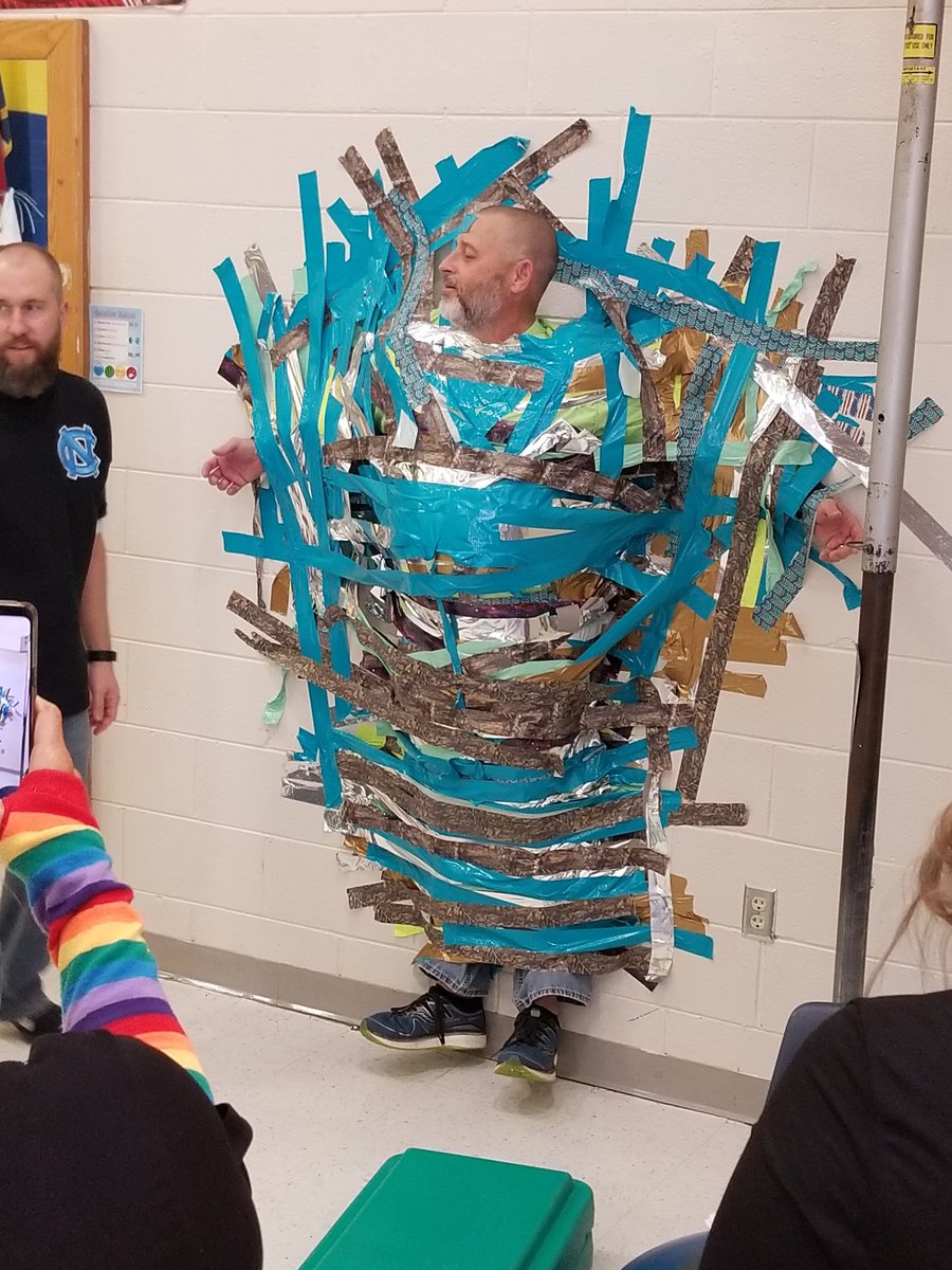 South_CCS's tweet photo. Taping the principal to the wall for reaching iStation goals!   Fun times during Read Across America Week! https://t.co/8XgvCZpyI8