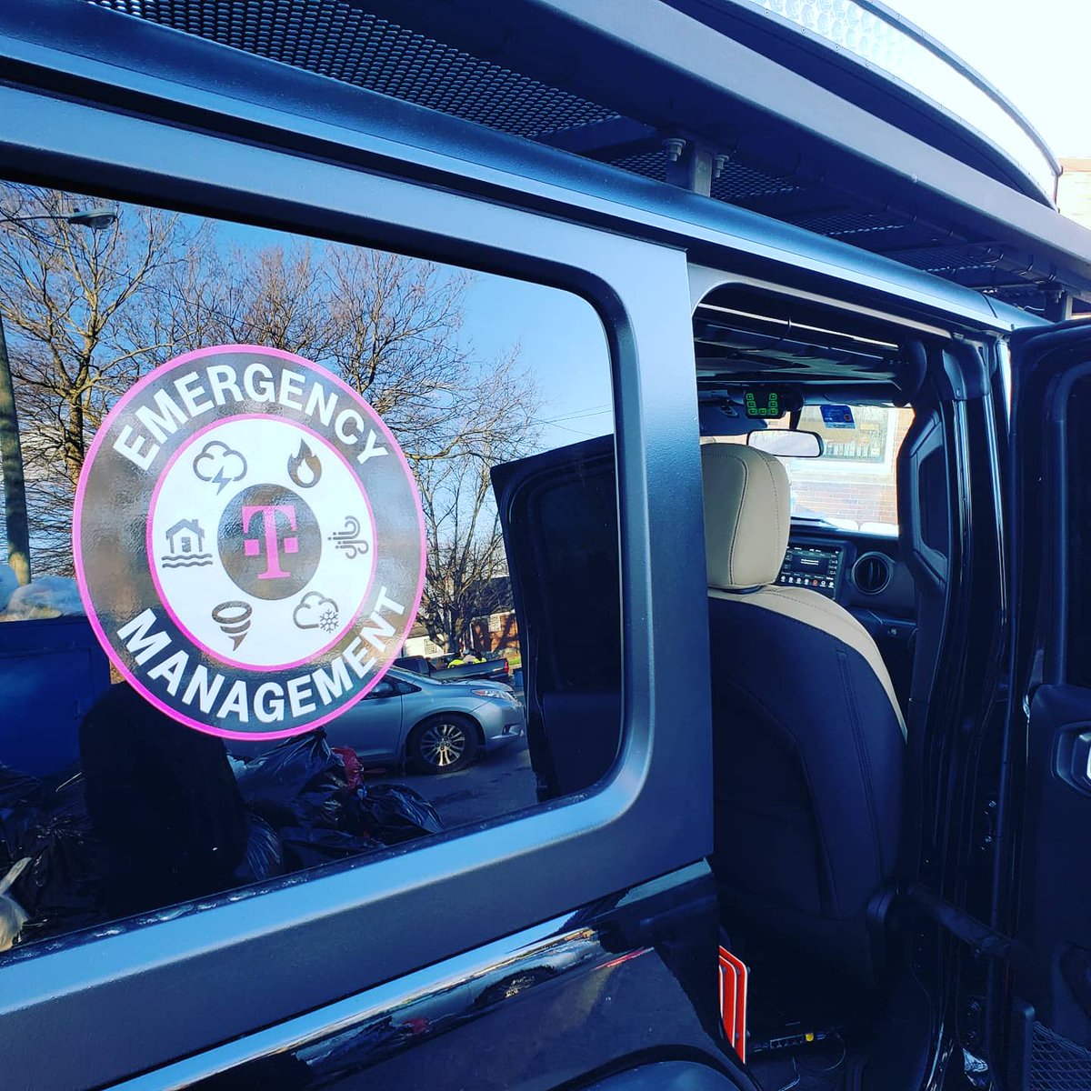 AnthonySauafea's tweet photo. Middle TN was hit hard with the storm this week. I'm grateful the @tmobile family is out here to remind our community that we're here with them. #NashvilleStrong #TmobileStrong #BeMagenta https://t.co/BfWnLBWist