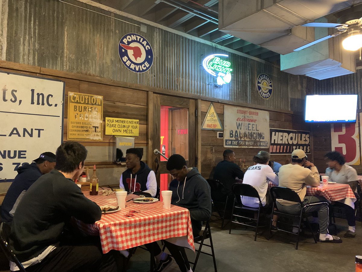 CoachCoax17's tweet photo. Breaking bread with my guys. We’re in the early stages of building this new @UNC_BearsFB brotherhood and building something special. Day 3 of Spring Ball in the morning and we put on some pads! Let’s get it! #TipOfTheSpear #DollaBoyz https://t.co/8fGLzqPTCY