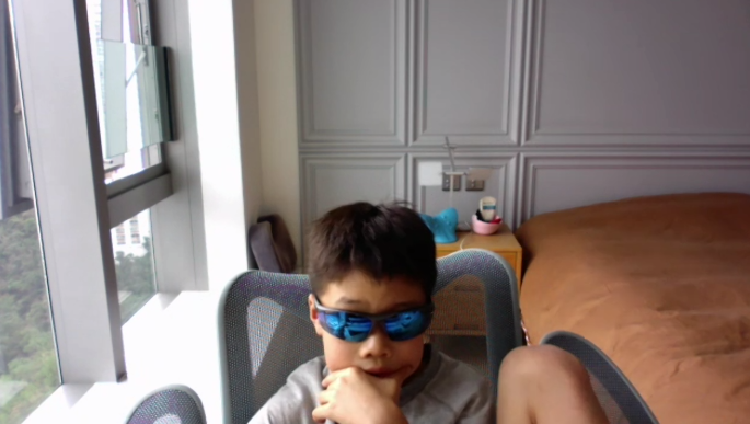 DoejiStar's tweet photo. At the end of our online session, this is my student putting on "gaming shades" to mean business playing anti-chess (as white) against me 😆
#chess #variant #antichess https://t.co/Ayrvn0GcKt