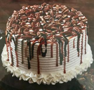 MIXX Ice Cream has a yummy Turtle cake.  Made with yellow cake as the base, vanilla ice cream,  caramel, fudge, pecans Mixxed in.  Decorated with fudge, caramel, pecans on the outside.  As always, you can customize it to your liking. This cake is delicious!