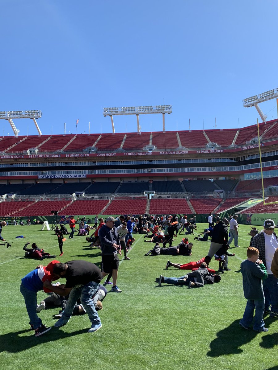 brohrlack's tweet photo. Dads being Dadswith their kids at the AllPro Dads ”Tickle Tackle” at Raymond James Stadium https://t.co/oB2aGtjjTx