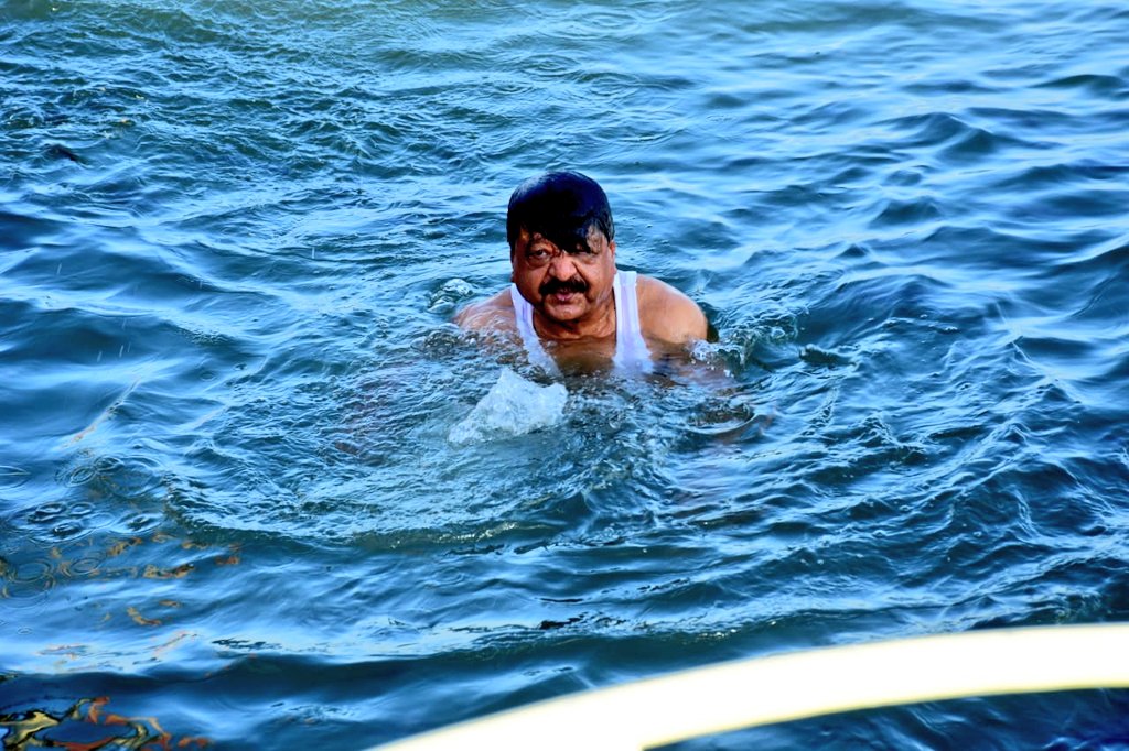 Kailash Vijayvargiya swimming on lake