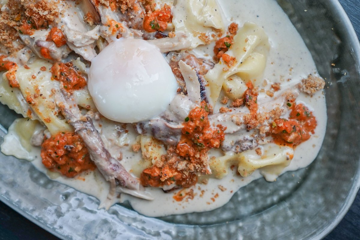 Farfalle with grilled rabbit is back, this time with cacio e pepe, mushrooms, romesco and a poached egg.