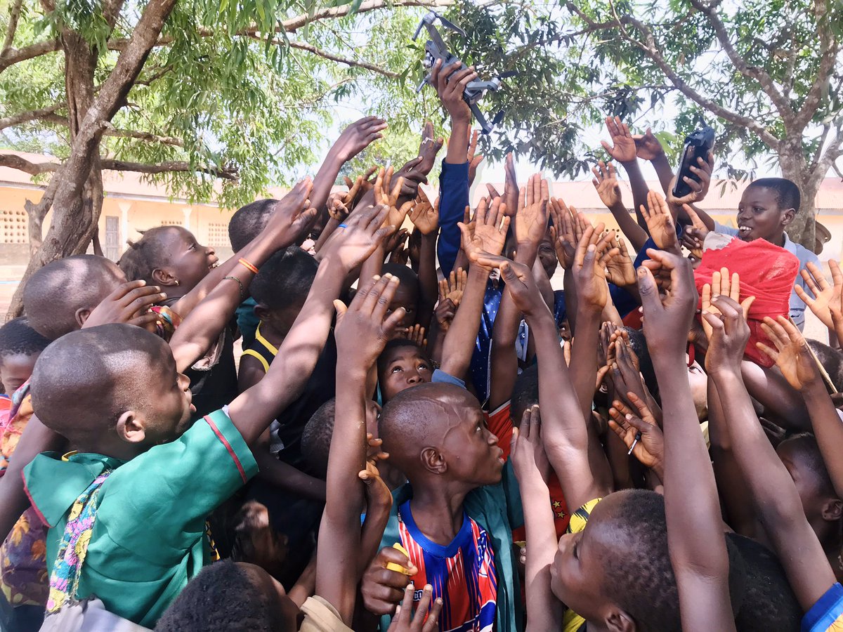 barmmyboy's tweet photo. Filming in Gbogbodo village Karene district with a DJI Mavic pro drone for the first time. My lil friends came out chasing this unfamiliar object, had to catch the drone in the air. Priceless reaction after a briefly explanation. #TreasureIntheForest https://t.co/2xM42niRXB