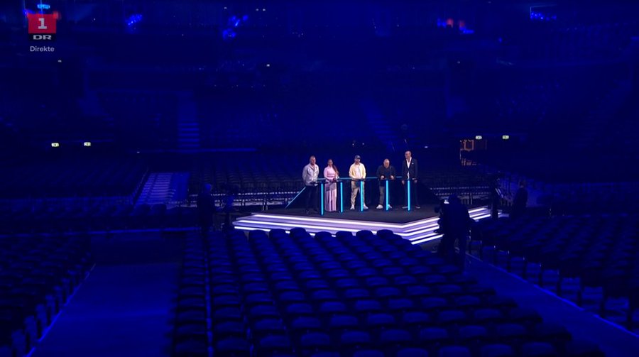 ozdale's tweet photo. First #COVIDー19 impact on Eurovision. The Danish national final #DMGP2020 played to an empty arena after government there banned events of more than 1000 ppl. However on the same night Sweden's #Melfest played to a packed arena. No change to Eurovision itself at this stage. https://t.co/jZDI97Q68w