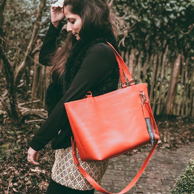 _Corner_Office's tweet photo. God Bless all the people who are really really happy with their Corner Office purchase. @mowaki here turning heads with her gorgeous red Interstella. A fabulous workbag, with lots of space; 100% italian leather, Handmade in Ukraine. 
We love you and than… https://t.co/7abxN8ncwQ https://t.co/edZvfH6VVN