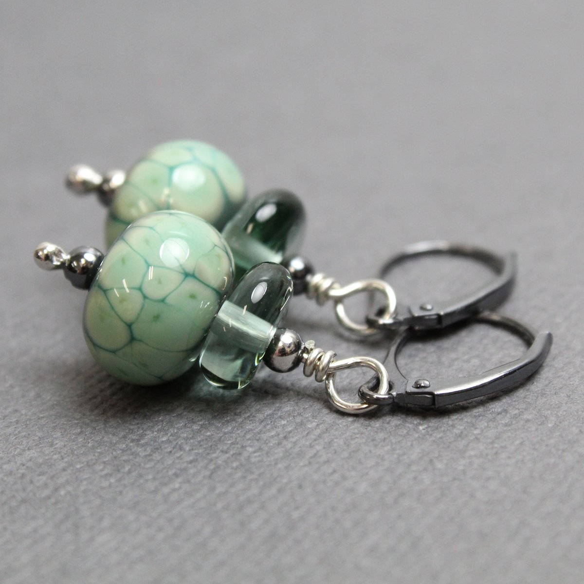 Turquoise Green Lampwork Bead Dangle Earrings with Sterling Silver Lever Backs ow.ly/nKfz50yE7wg #lampworkearrings #earrings #springfashion #bohofinds #springjewelry