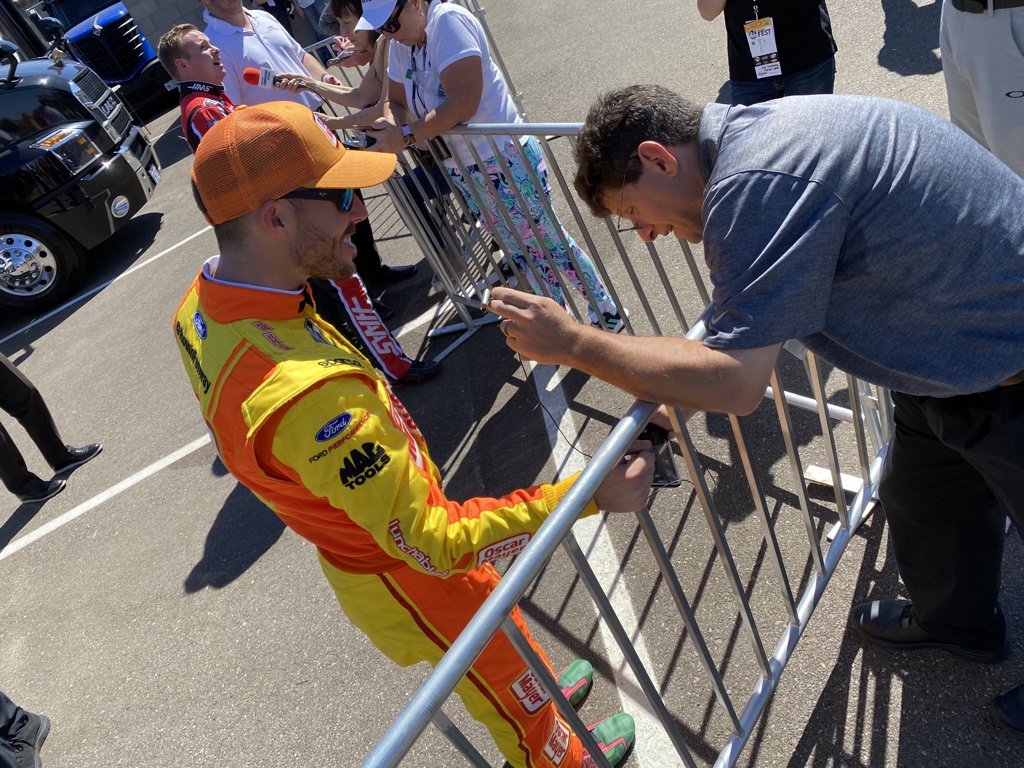 jeff_gluck's tweet photo. Caught @bobpockrass in action today taking a video of @RossChastainโs watermelon shoes while doing an interview at the same time. What *canโt* this man do? #BobSpotting #BobPic https://t.co/KOig1MtWXP