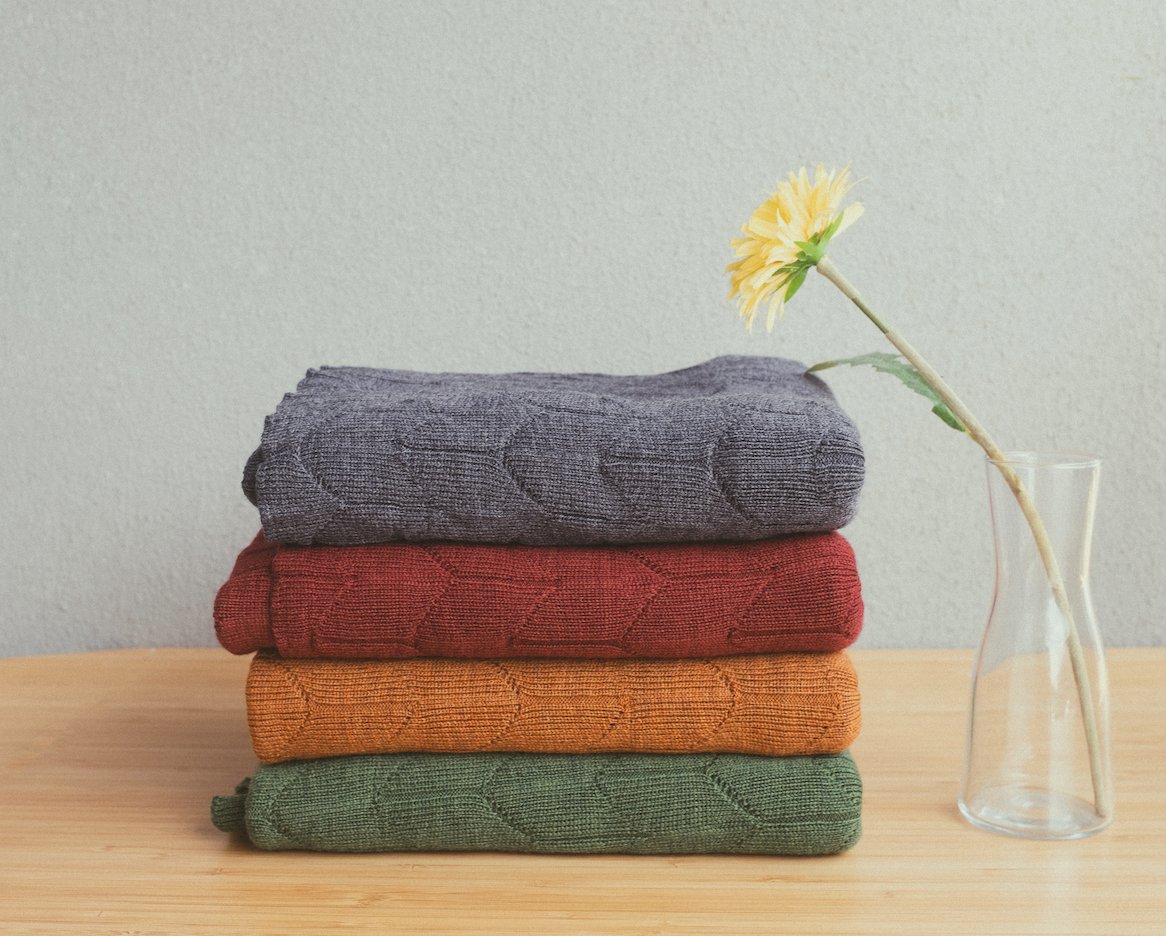 Pictured is our light weight Tulip Field scarves in four autumn colours. Made in Melbourne by 100% Australian extra fine Merino wool.⁠