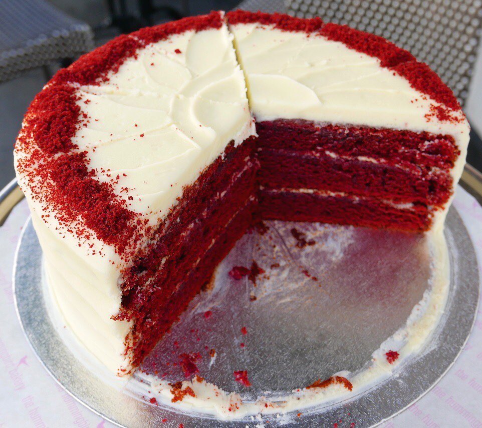 Our famous #RedVelvet is made from an authentic American recipe with cocoa and a splash of buttermilk. Luxurious cream cheese frosting is the perfect match for this deep red sponge. Have a slice today. #HummingbirdBakeryME #Tasty #Happiness #Cake #Dessert