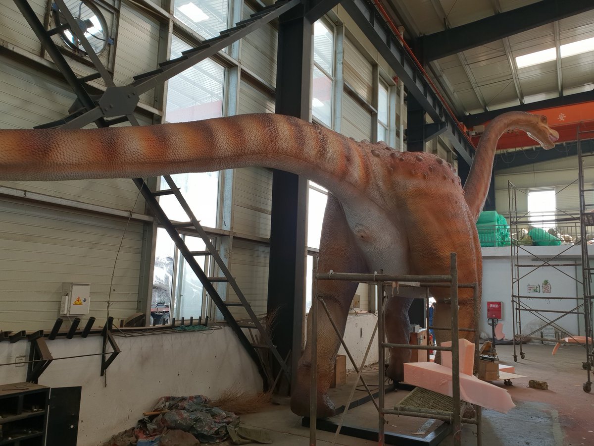 TetZoo's tweet photo. In January 2019, I worked in Zigong, China on the construction of life-sized #dinosaur models. It was great fun. My colleague Shirley features in some of the photos here. We're wearing masks because of the paint. https://t.co/s5znvjgXtM
