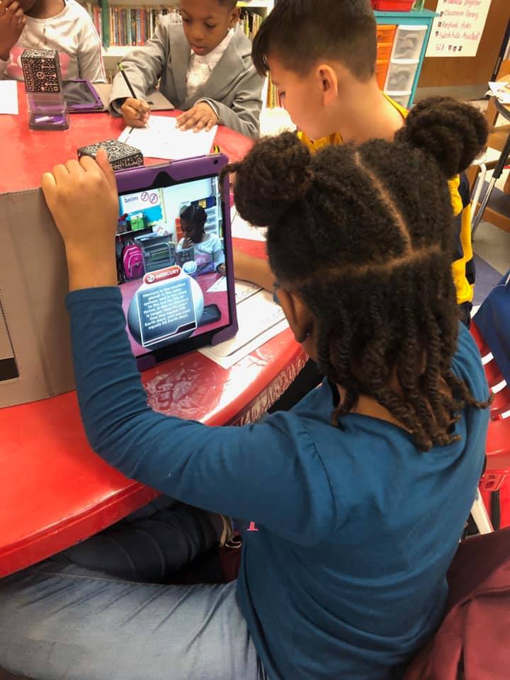 IT'S A SMALL WORLD! 4th graders at MES used the Merge Cubes & Galactic Explorer app to dive into Augmented Reality. They completed a scavenger hunt with the text of the planet features on the app. #InspireEmpowerLead #atraditionofexcellence #TheHanoverPromise #EmpoweredLearner