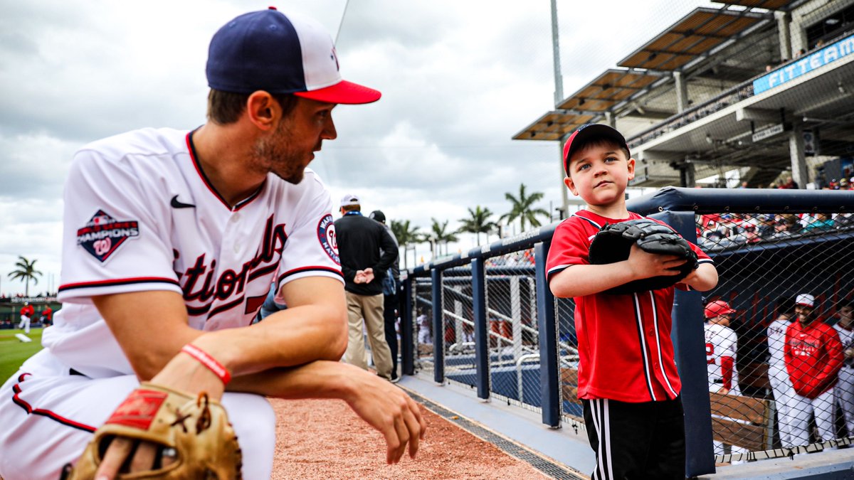 MLB's tweet photo. Before throwing out the first pitch at today's @Nationals game, Drew had a catch with one of his favorite players, @treavturner. https://t.co/NiTHi86h4g
