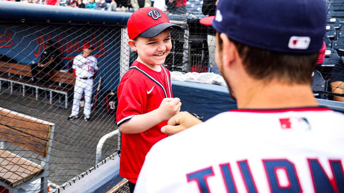 MLB's tweet photo. Before throwing out the first pitch at today's @Nationals game, Drew had a catch with one of his favorite players, @treavturner. https://t.co/NiTHi86h4g