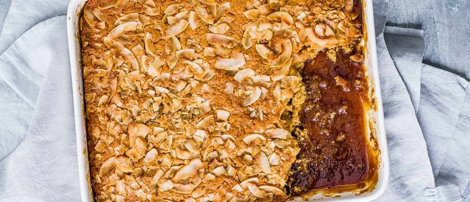 olivemagazine's tweet photo. Everyone run to the table, it's #selfsaucing pudding time! Grab a spoon and tuck into our caramel-coconut bake today https://t.co/w0YqXYuJvu https://t.co/qHvy9NFgUA
