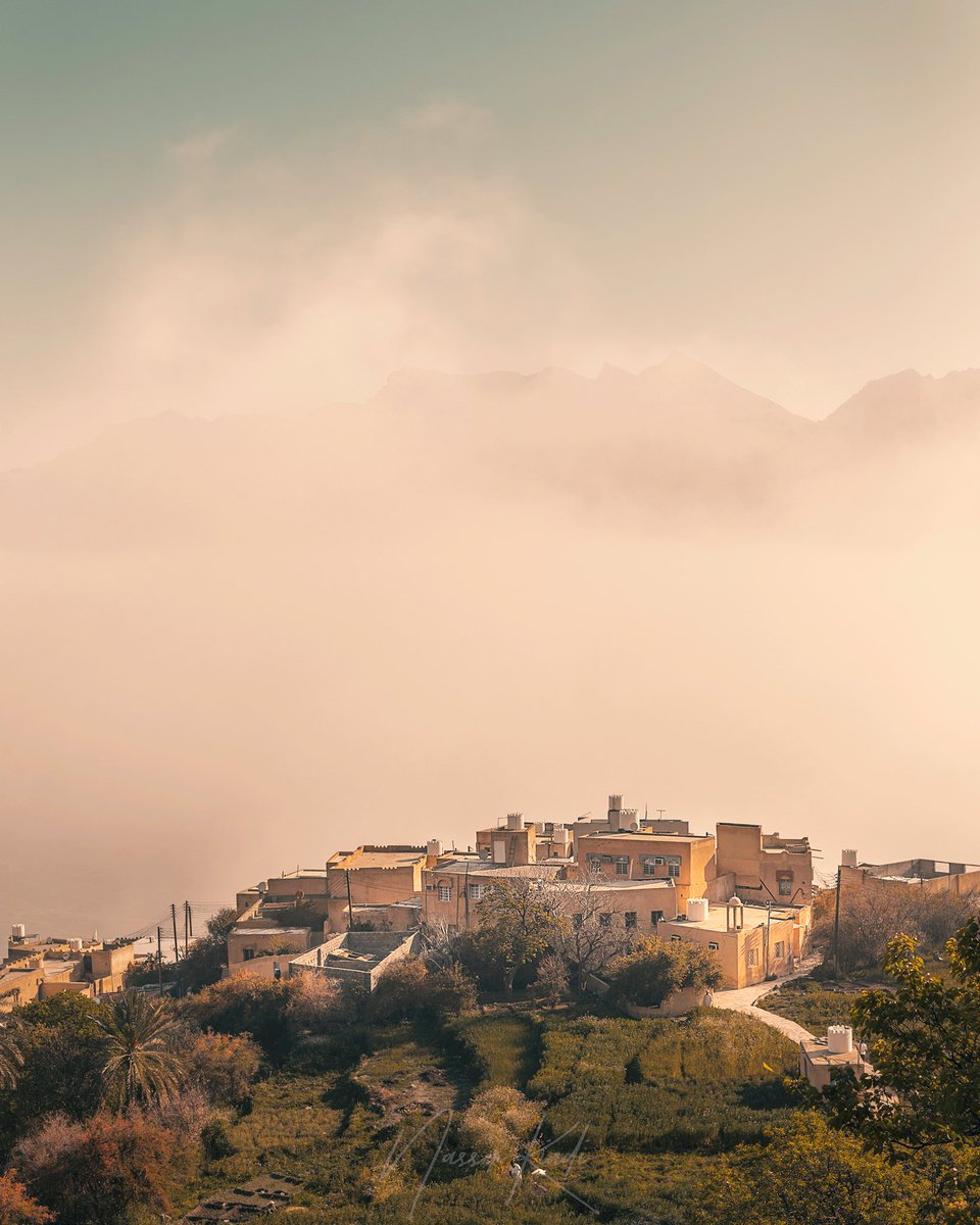 NasserAlKindi's tweet photo. Nestled between mountains, the village of #wikan in #oman is best visited early in the morning. As the sun arches over the blue sky, it casts its rays in the village for a brief few hours before setting behind the mountains in the early hours of the afternoon. https://t.co/mdYwoxGbKu
