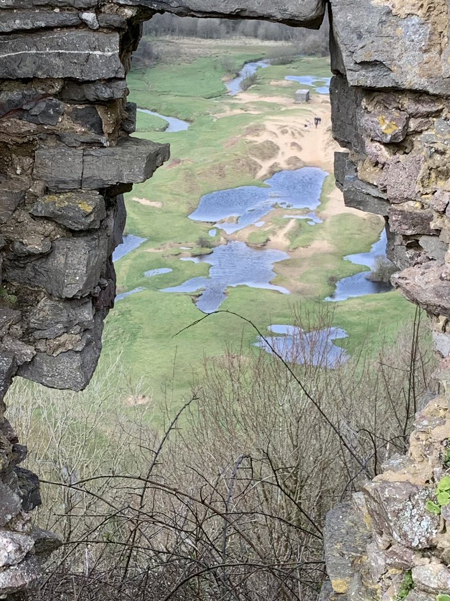 Through this hole in Pennard Castle, it looks like a giant fell over and left a pond... @PennardGolfClub @Pennardprimary #herebegiants