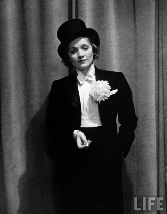 GnmYou's tweet photo. 1. On #InternationalWomensDay it is worth considering the affect of gender on how people dress. Actress Marlene Dietrich challenged gendered forms of dress in the 1920s by wearing a tuxedo, a form of dress traditionally considered masculine. https://t.co/V7kwwiedx0
