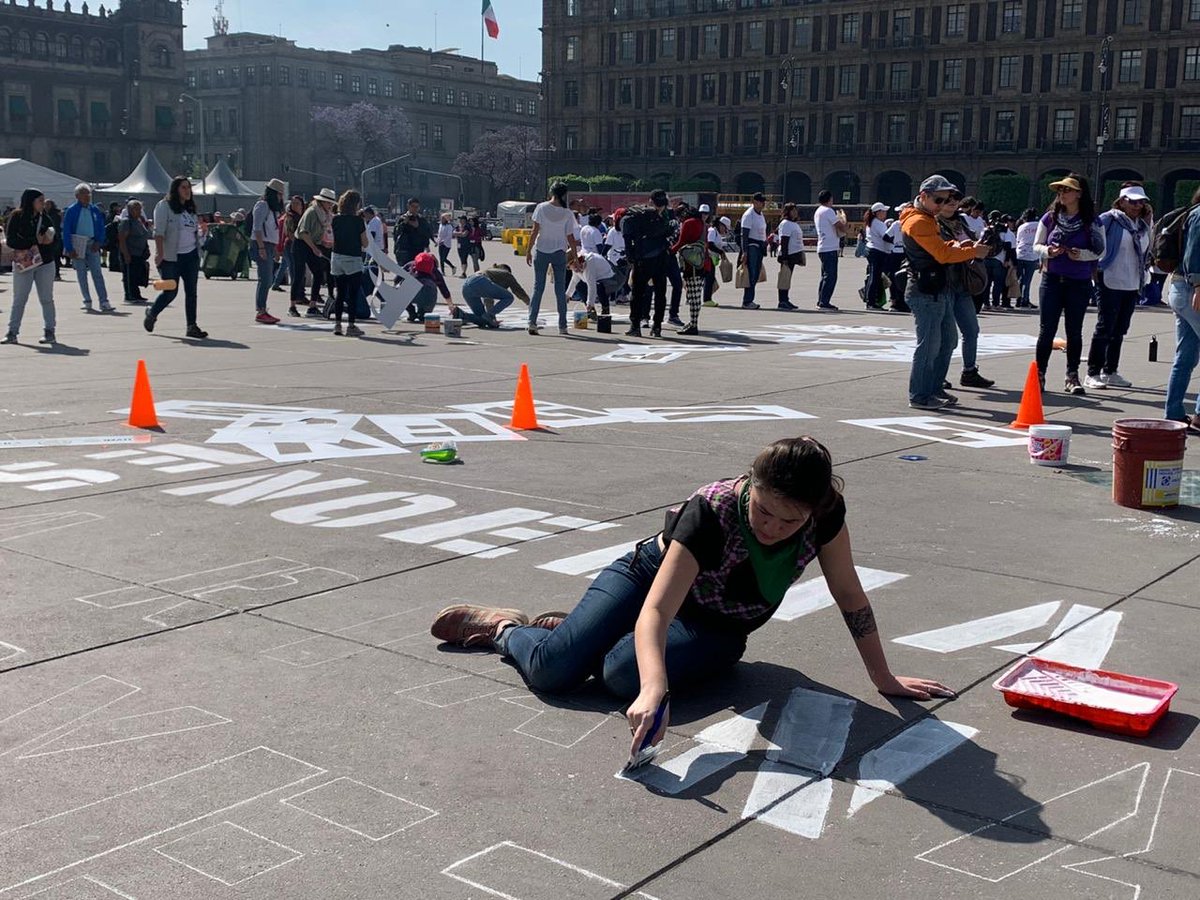 in el zocalo, painting the names of 3k femicide victims. more on the protests here:  https://twitter.com/i/events/1236694991520428032