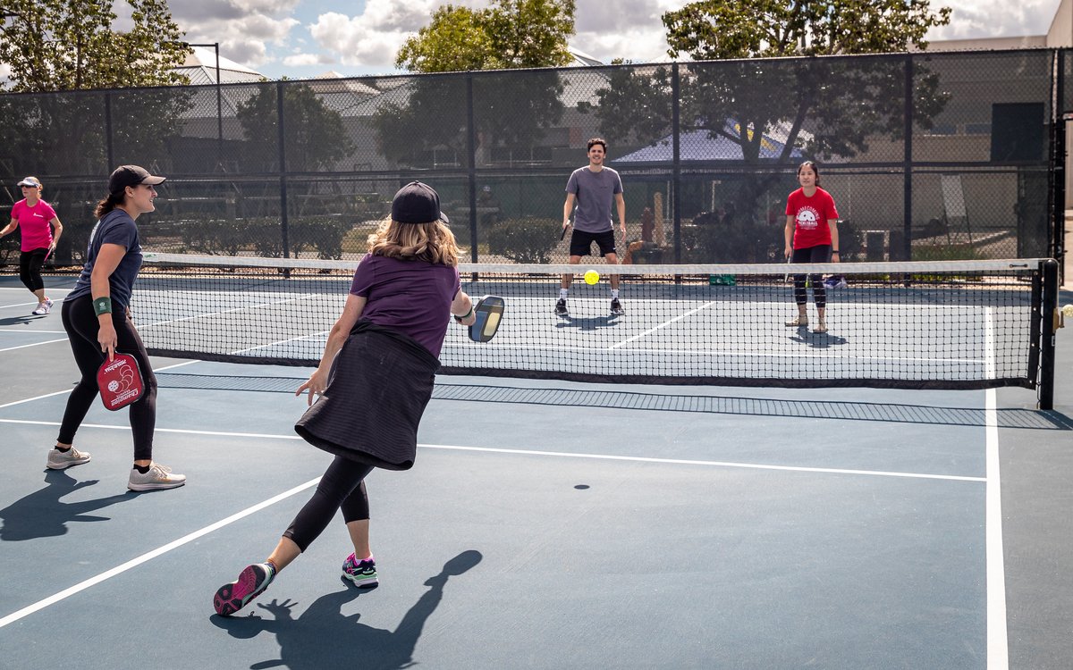 LLUHealth's tweet photo. In case you didn’t know, pickleball is kind of a big “dill” –– LLU School of Medicine smashed it out of the court in today’s tournament! #LLUHomecoming https://t.co/iHWeilFTXI